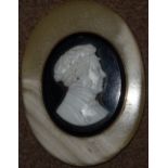 Cameo, 19th century cameo bust of an artist facing right, mounted on black stone,