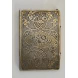 A mid Victorian silver cased notebook, hinged,