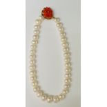 A cultured pearl necklace of evenly sized pearls (approx.), 1.