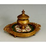 A late 19th Century French gilt metal and porcelain inkwell,