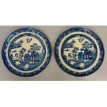 Two large circular Willow pattern chargers, transfer printed, 42cm diameter,