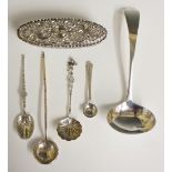 A selection of silver items to include: an interesting spoon,