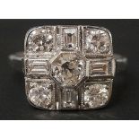 An 18ct white gold and diamond ring in Art Deco style the rounded square tablet set to the centre