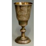 A Russian silver vodka goblet, the body engraved with floral motifs,