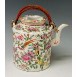 A Cantonese famille rose teapot of cylindrical form with dished circular lid,