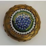 An Italian gilt metal and micro mosaic circular box of compressed form,