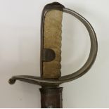 An 1855 German heavy cavalry sword with pierced basket, wire bound suede grip, steel scabbard,