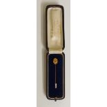 A 15ct gold and sapphire stick pin,