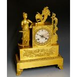 A mid 19th Century ormolu clock the silvered dial with Roman numerals contained within an acorn and