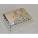 A Japanese silver coloured metal cigarette box of rectangular form,