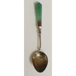 A silver coloured metal spoon with tapered jadeite handle, 11cm long,