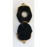 A late Victorian gilt metal mounted black velvet double sovereign purse,