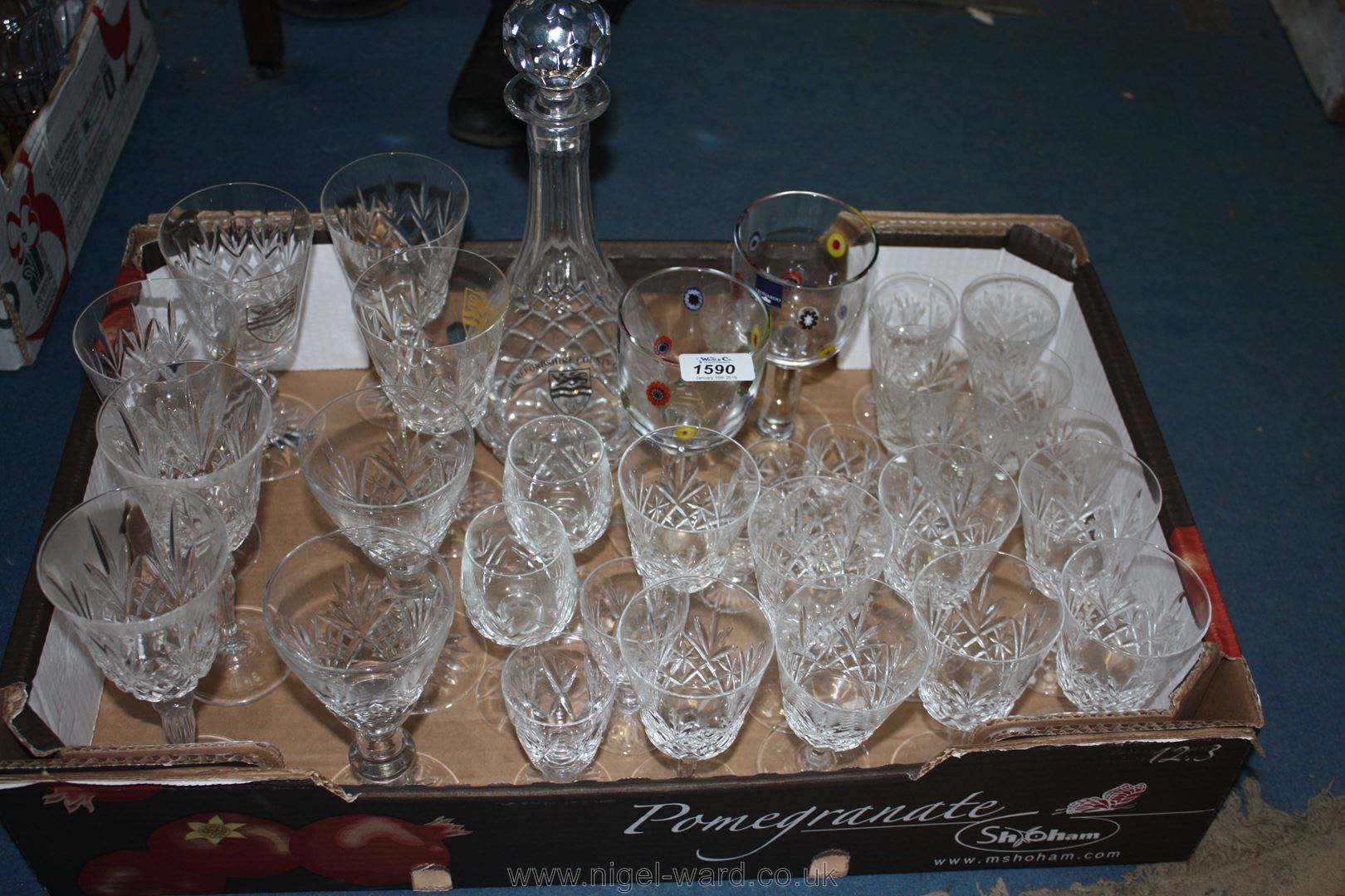 A large quantity of cut glass Wine and Sherry Glasses and matching Decanters with stoppers,