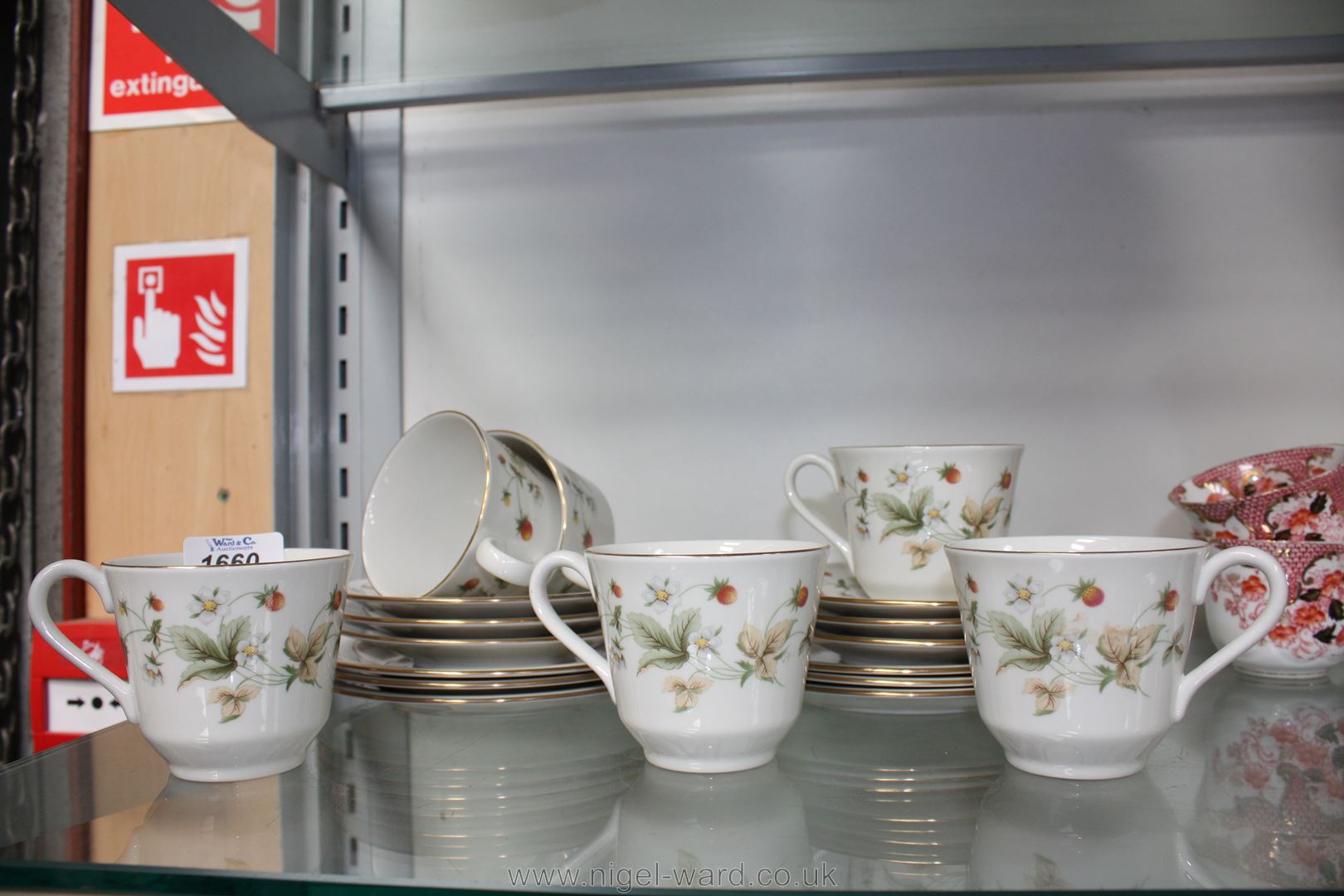 A Royal Doulton Teaset ''Strawberry Cream'' comprising six cups, saucers and tea plates.