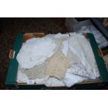 A quantity of Linen including tablecloths, tray cloths, dressing table sets, etc.