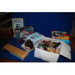 Miscellaneous doll's house furniture, six jigsaws, cribbage board, Stylophone electronic organ,