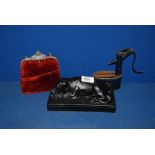 A model of a Labrador, a tin-plate water pump and small velvet Handbag.