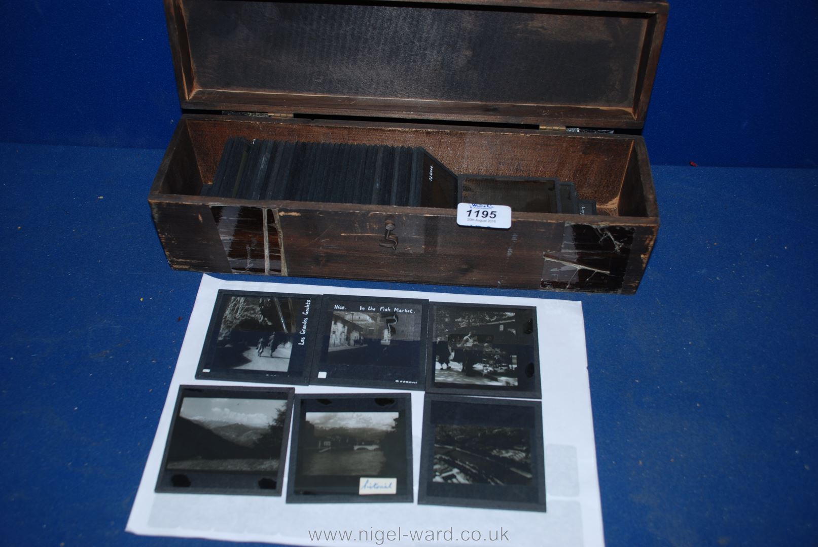 A box containing around 100 Magic Lantern Slides.