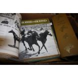 A box of bound Horse & Hound magazines