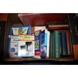 A box of books: Windows 7, novels,