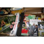 Three boxes of books: sport, football programmes, gardening,