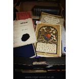 A box of books: English/French dictionary,