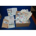 A large quantity of Postage Stamps including pages from old albums and approval books.