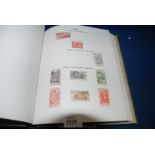 A green Freelance Stamp Album with Czechoslovakia stamps,