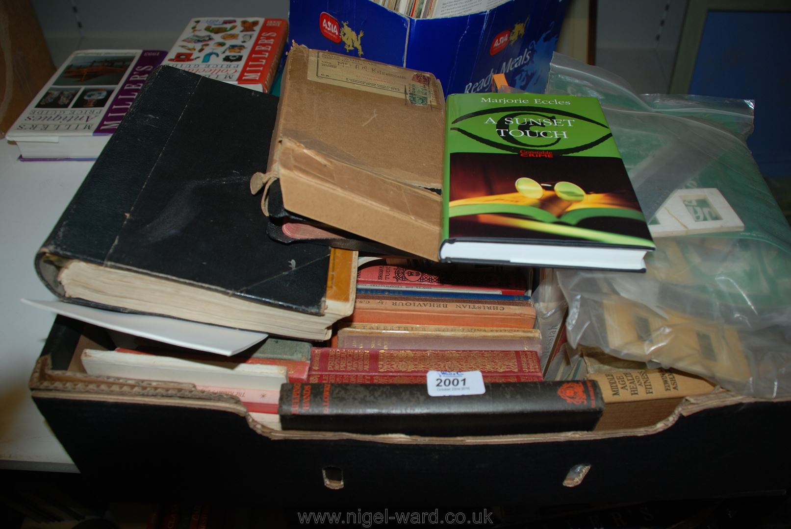 Quantity of novels including: A Sunset Touch, religious books etc.