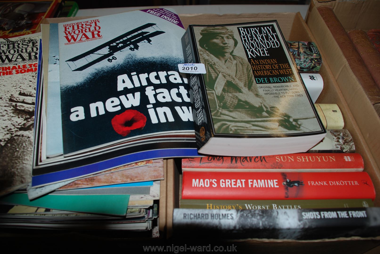 A box of Books on battles and another box on The History of the 1st World War.