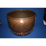 A large and heavy copper Wood Container, 19'' diameter x 13'' deep.