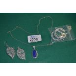 A 925 Silver Necklace and two pairs of earrings