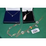 Four pieces of sterling Silver Jewellery including a bracelet with Mother of Pearl links,