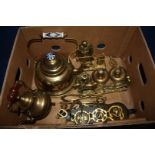 A quantity of brass including kettle, coffee pot, horse brasses, blacksmith figure,