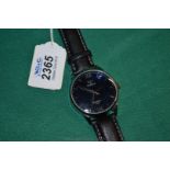 A Gent's Scandinavian Designer Style Quartz Wrist Watch with Cobalt Blue Face & Black Strap.