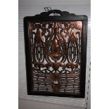 A large pierced Copper Arts & Crafts Grill with stylised flowers,