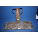 An Arts & Crafts Copper Tray with hammered water babies detail and a two handled repousse Vase