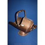 A Helmet shaped Copper Coal Scuttle