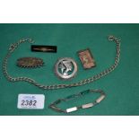 A Silver Watch Chain, miniature notebook and pencil, brooches, etc.