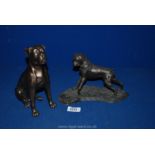 Two composite Boxer Dog figures.