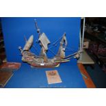 A model of ''The Golden Hind'' with instruction book.