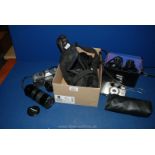 A pair of boxed Hunter 8 x 40 Binoculars, Canon TX camera with 50m lens, Agfamatic 3000, Halina,