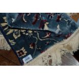 A blue and red ground Cashmere patchwork Rug