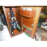 A COOKE THOUGHTON AND SIMMS CASED MICROSCOPE