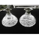 PAIR OF SILVER AND TORTOISESHELL TOPPED TABLE BOTTLES