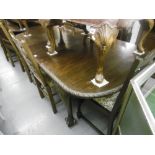 A MAHOGANY DINING TABLE,