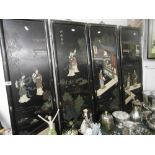 FOUR BLACK LACQUERED  ORIENTAL WALL PANELS