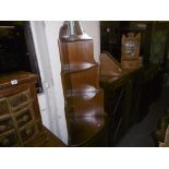 A MAHOGANY CORNER CUPBOARD