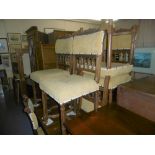 A FRENCH EXTENDING TABLE AND EIGHT CHAIRS