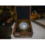 A CASED SHIPS COMPASS